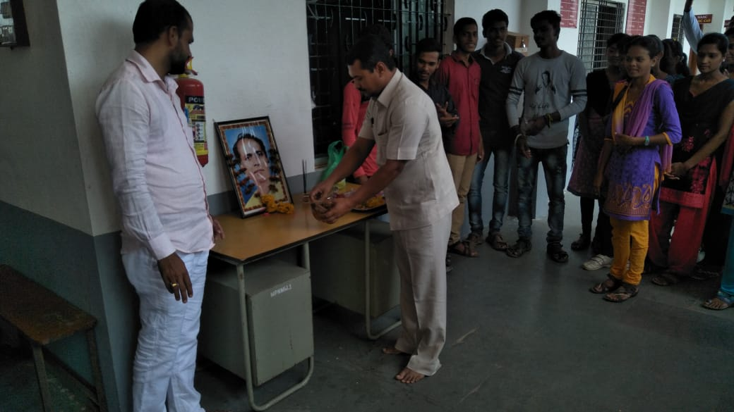 Students attending seminar session in auditorium